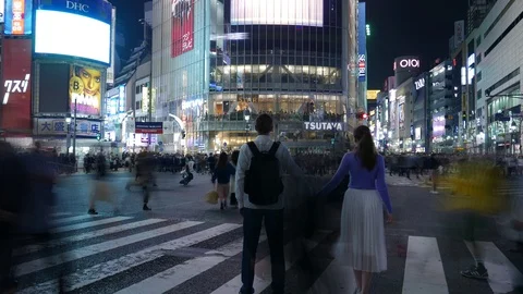 Timelapse romantic couple posing at Shibuya crossing, Tokyo, Japan Stock Footage 99590663