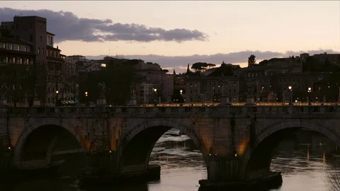 Timelapse Rome, dramatic view of Saint'Angel Bridge at dusk with River Video stock 103627365