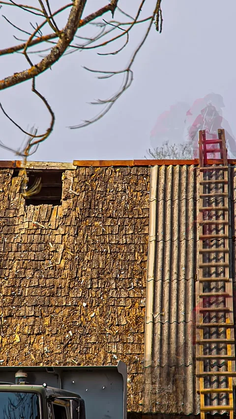 Timelapse of roof work showing workers climbing ladder and completing roof Stock Footage 304404308
