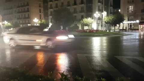 Timelapse of roundabout in a rainy night Stock Footage 171618515