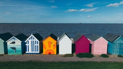 Timelapse of row of beach huts on coast of Kent, England, UK Stock Footage 96239327