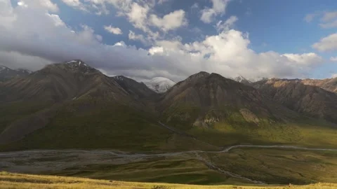 Timelapse of running clouds in the mountains Video stock 168932076