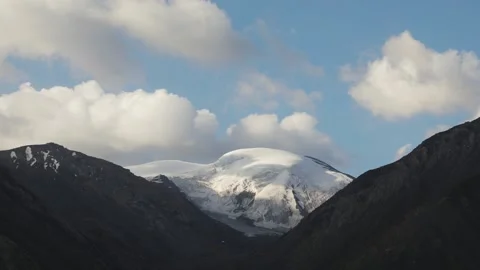 Timelapse of running clouds in the mountains Stock Footage 168932117