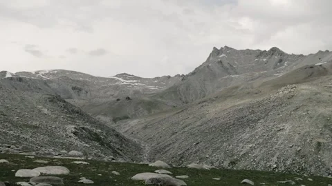 Timelapse of running clouds in the mountains Stock Footage 169061623