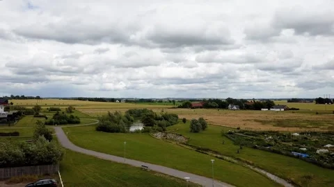 Timelapse of rural landscape and clouds outside the town of Lund, Sweden Stock Footage 135311529