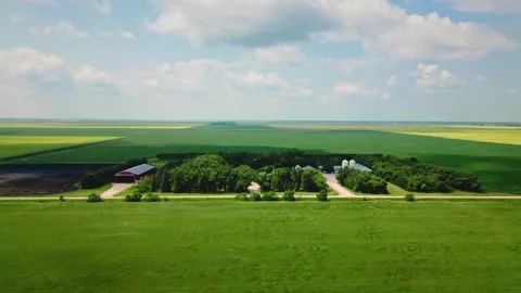 Timelapse of Rural Wheat Farm with Moving Clouds on Canadian Prairies Stock Footage 342013723