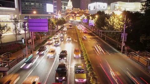 Timelapse of rush hour traffic in Jingan District at night , Shanghai, China Stock Footage 40332443