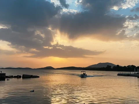 Timelapse of sailing boat by sunset. Reflection of sea water Stock Footage 248017373