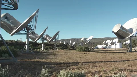 A timelapse of satellites simultaneously rotating as they search the heavens for Stock Footage 107478396