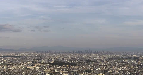 TimeLapse - Scenery from evening to night Osaka, Japan. Bird's-eye view Pan LtoR Stock Footage 160636653