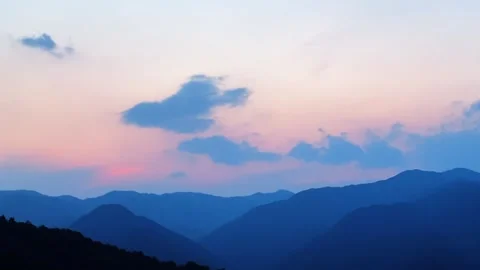 Timelapse of Scenic Sunset and Clouds Over Mountainous Landscape, China 動画素材 336758493