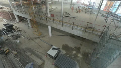 Timelapse of scissors lifts in building at construction site Video stock 219696765