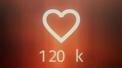 Timelapse screen pixels social media likes counter changing over blurred feed Stock Footage 328537705