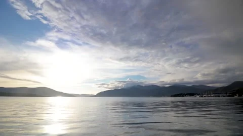 Timelapse sea and clouds In the sun Video stock 145910149