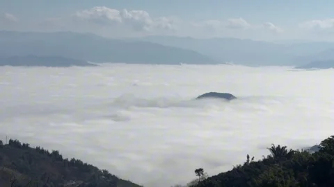 Timelapse of Sea of Clouds Flowing over Tibetan Mountains Stock Footage 325262478