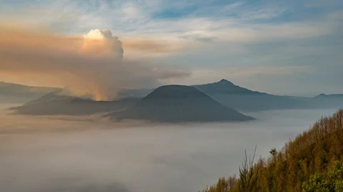 Timelapse sea of clouds in Mount Bromo, overlooking Mount Semeru volcano Stock Footage 96618381