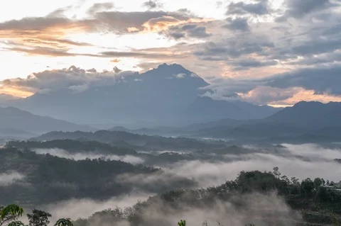Timelapse of Sea of Clouds with Mount Kinabalu as background at sunrise Stock Footage