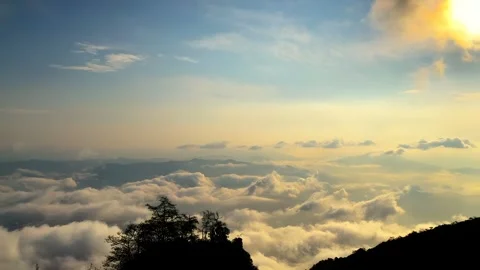 Timelapse of Sea of Clouds Over Mountain Peaks in Sichuan, China at Sunrise Stock-Footage 336647267