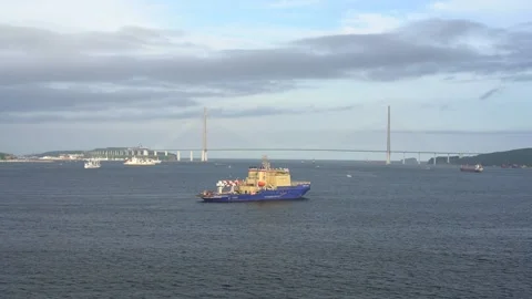 Timelapse of the seascape with a view of the ship and the Russian bridge. Stock Footage 135740755