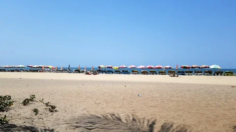 Timelapse of seashore with sun beds Stock Footage 109434677