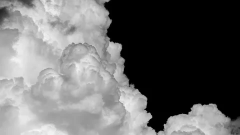 Timelapse of Separate white clouds on a black background have real clouds. Stock Footage 194273004