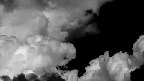 Timelapse of Separate white clouds on a black background Stock Footage 196060068