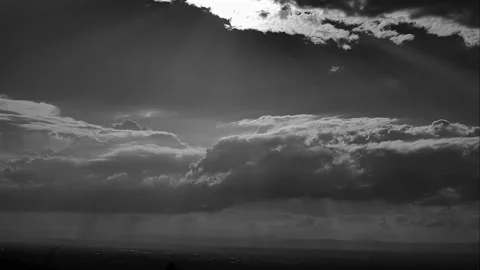Timelapse of Separate white clouds on a black background has real clouds. 스톡 동영상 202625013