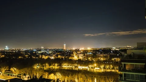 Timelapse Sequence of Paris, France - Rooftops in Paris with the Sacre-Coeurr in Stock Footage 88557722