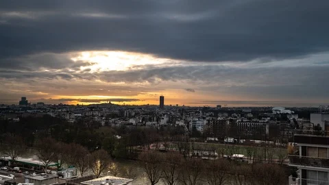 Timelapse Sequence of Paris, France - Rooftops in Paris with the Sacre-Coeurr in Stock Footage 88557873