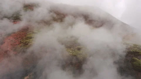 Timelapse a sequence of trade wind clouds moving through a mountain valley. The Stock Footage 106242372