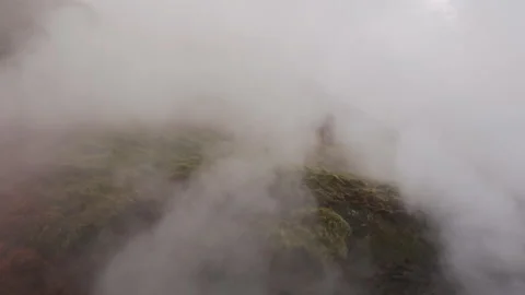 Timelapse a sequence of trade wind clouds moving through a mountain valley. The Stock Footage 106250453