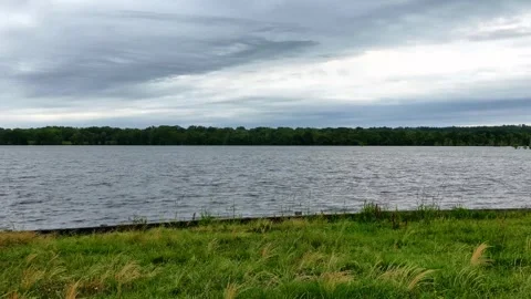 TimeLapse of a Serene Lake at Sunset Video stock 307896293
