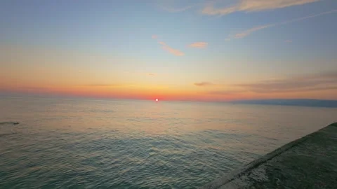 Timelapse of Serene Sea During Sunset Stock Footage 311963201