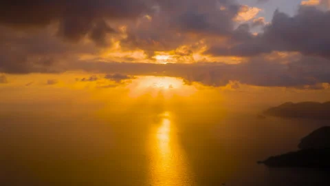 Timelapse: setting sun over sea near Oludeniz with fast dark clouds Stock Footage 341282879