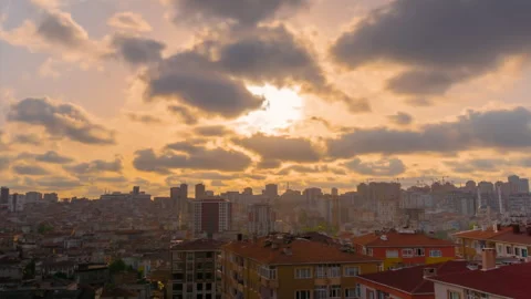 Timelapse: setting sun shining through fast clouds over Istanbul Stock Footage 341296209