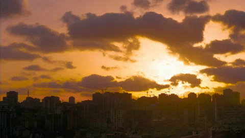 Timelapse: setting sun shining through fast clouds over Istanbul Stock Footage 341297970