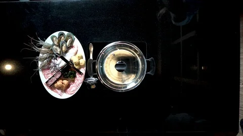 Timelapse shabu put on table Stock Footage 120979058