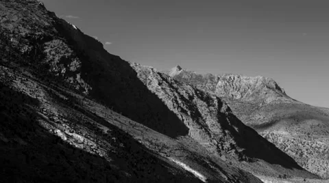 TIMELAPSE: Shadows running through the mountains Stock Footage 31626266