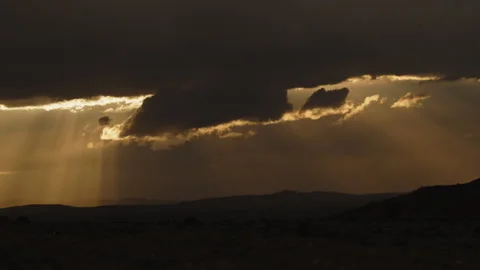 Timelapse of shafts of sun rays and clouds as a storm approaches near Torrey, Stock Footage 338202858