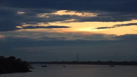 Timelapse of ships moving on the river at evening time. Stock Footage 299342867