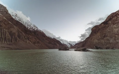 Timelapse shooting Snow Mountain and lake In Tibet Stock Footage 229759533