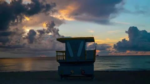 Timelapse shot in 4K of Sobe South Beach sunrise lifeguard station in Miami Beac Video stock 64035971