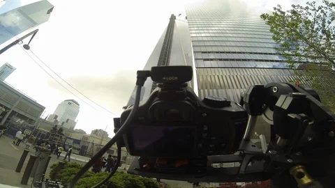 Timelapse shot of camera facing up toward city buildings Stock Footage 99175814