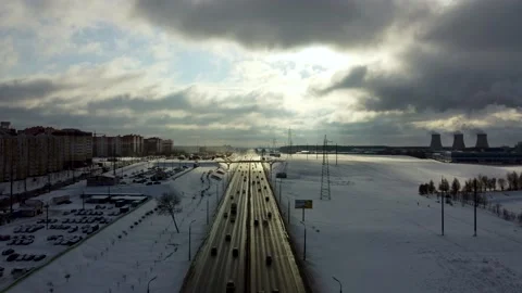 Timelapse shot of highway with cloudy sky on winter day Stock Footage 169480803