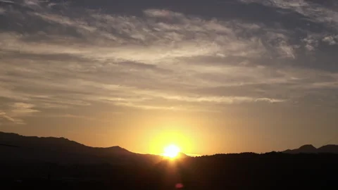 Timelapse shot of the movement of clouds in the blue sky. 4K Stock Footage 286299436