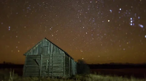 Timelapse shot of an old barn with starry sky Stock Footage 36295822