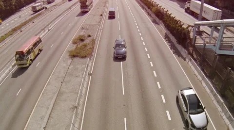 Timelapse shot of typical highway traffic. Video 1080p Stockbeeldmateriaal 59885424