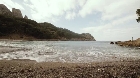 Timelapse shot of waves hits te shore. Empty beach. Mallorca, Spain. Beautiful Stock Footage 85285601