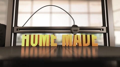 Timelapse showing the 3D printing process of the Home Made text on a printe.. Stock Footage 291875060