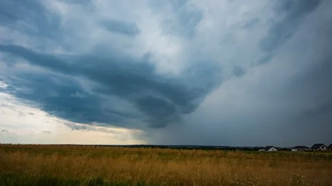 Timelapse showing an approaching storm cell over grain fields. Stock Footage 301430353